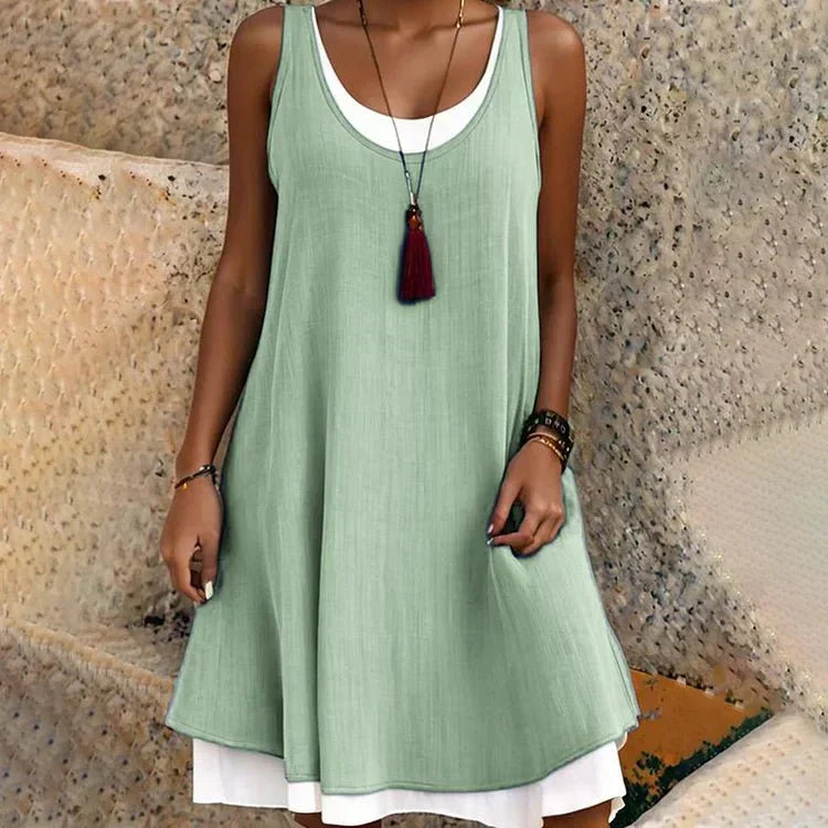 MODEGEIST Damen Lagen-Mini-Kleid Ärmellos Rundhals Zweifarbig Schwarz-Weiß