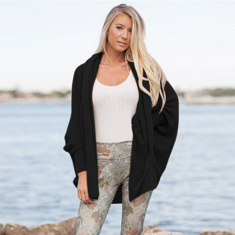 Damen Grobstrickjacke im lässigen Oversized-Stil mit tiefem Schnitt und voluminösen Ärmeln ModeGeist