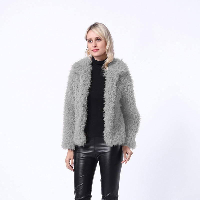 Damen Modischer Kunstpelzjacke mit elegantem Kragen und seitlichen Taschen ModeGeist