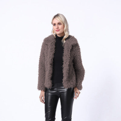 Damen Modischer Kunstpelzjacke mit elegantem Kragen und seitlichen Taschen ModeGeist