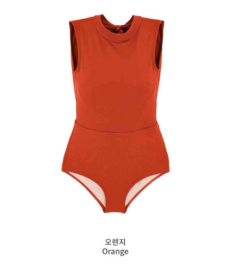 Elegantly designed swimsuit for women, featuring an exclusive back cutout and decorative bows.