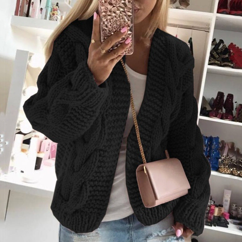 Damen Strickjacke mit grobem Zopfmuster und lässigem Schnitt ModeGeist