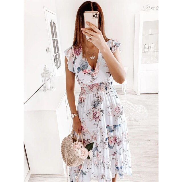 Laura: Blumiges Kleid mit V-Ausschnitt und Druck