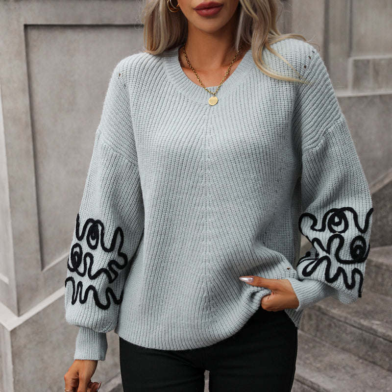 ModeGeist | Strickpullover mit Bestickten Ärmeln Lockere Passform Kreativ und Schick