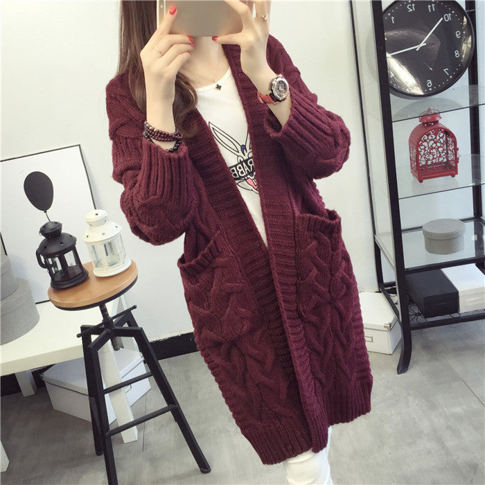 Damen Grobstrickjacke mit elegantem Zopfmuster und praktischen Taschen ModeGeist