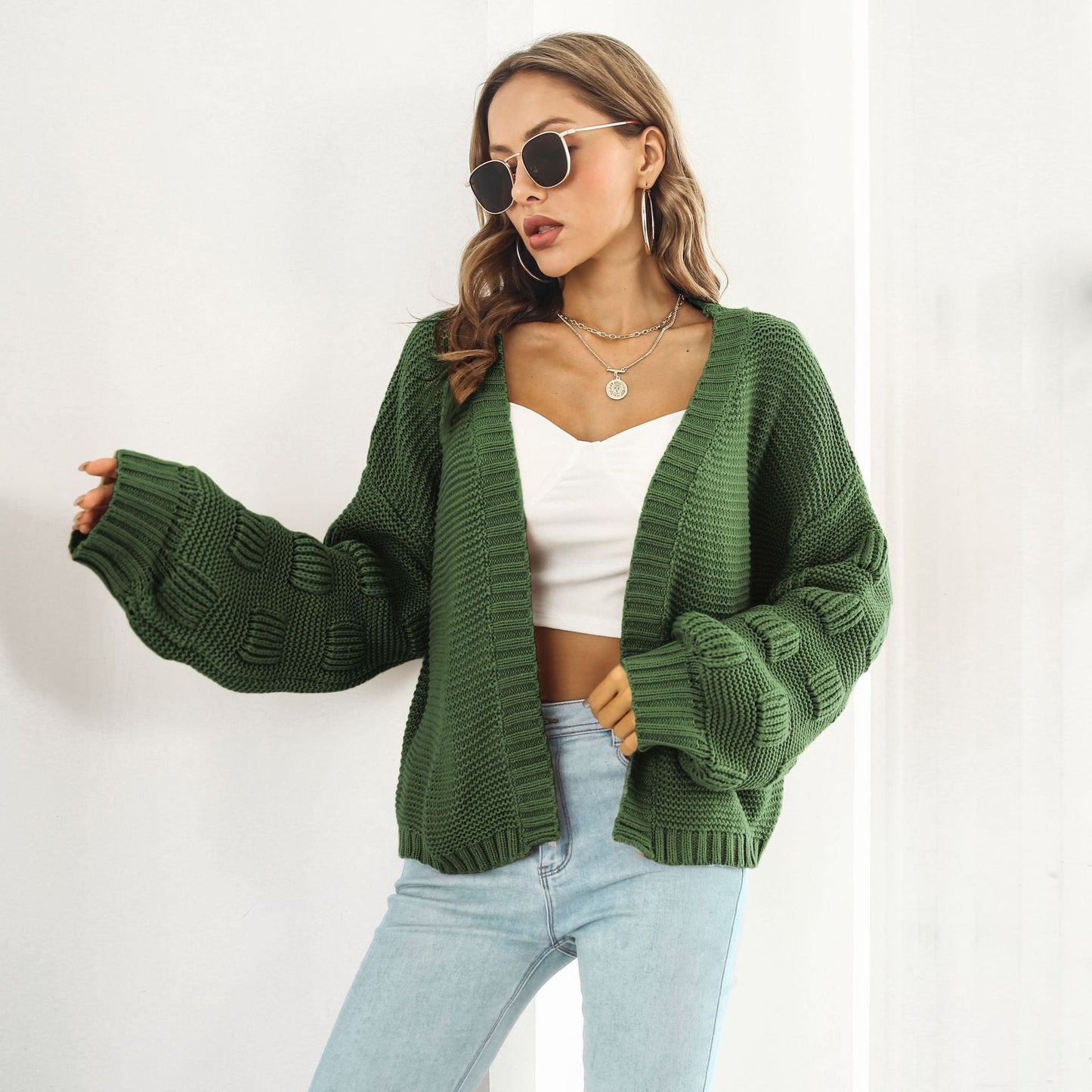 ModeGeist | Schicke & gemütliche Strickjacke mit Puffärmeln