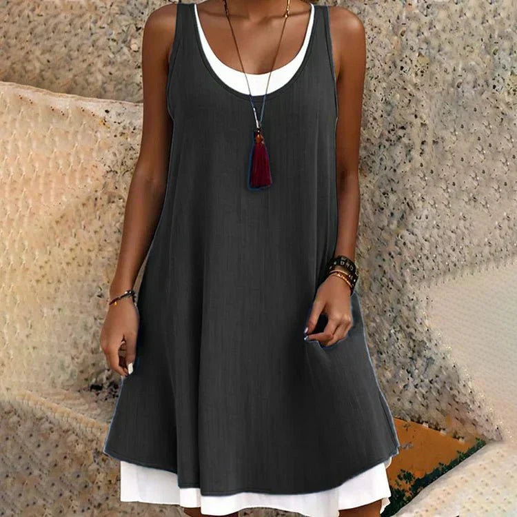 MODEGEIST Damen Lagen-Mini-Kleid Ärmellos Schwarz Weiß