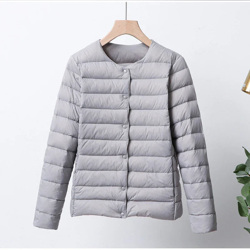 ModeGeist | Faltbare Pufferjacke mit Druckknopfverschluss