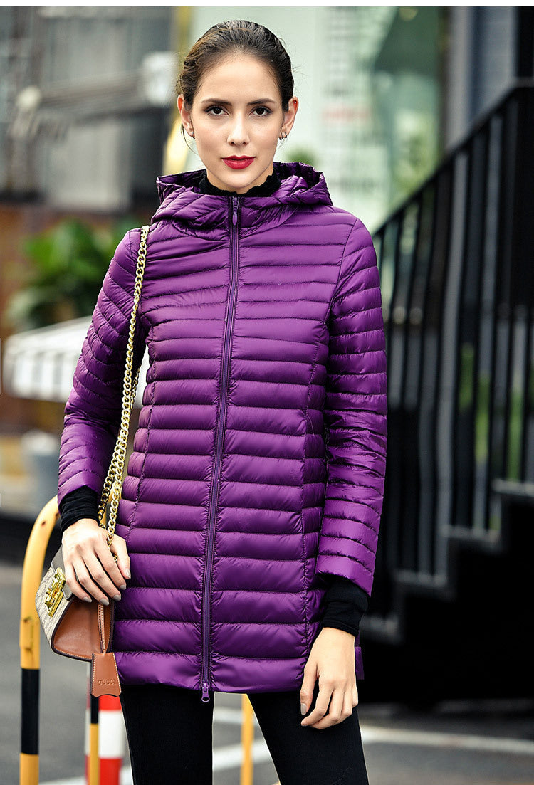 ModeGeist | Lange Daunenjacke mit Kapuze "Praktische Leichtigkeit"