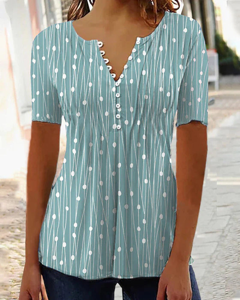 Modebewusste Damenbluse mit kurzen Ärmeln und dekorativen Knöpfen