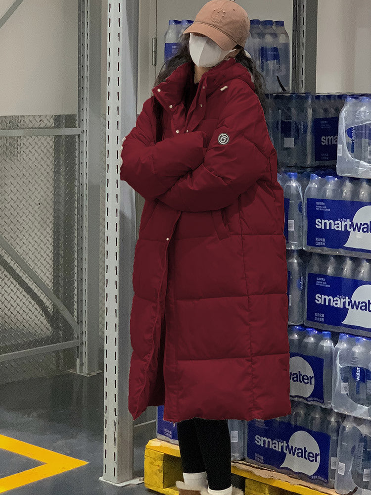 Damen Lange Steppjacke mit Kapuze und hohen Kragen ModeGeist