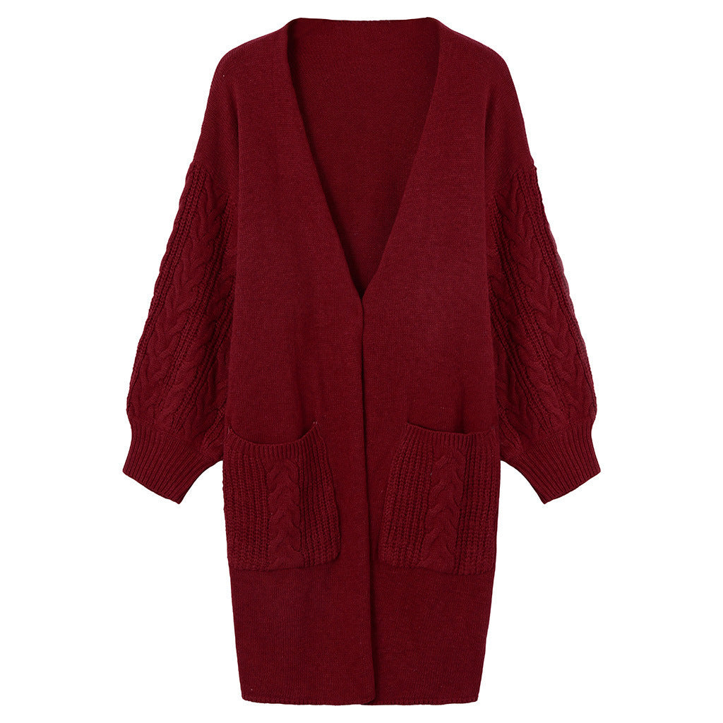 Damen Strickmantel mit tiefem V-Ausschnitt und groben Zopfstrickdetails ModeGeist