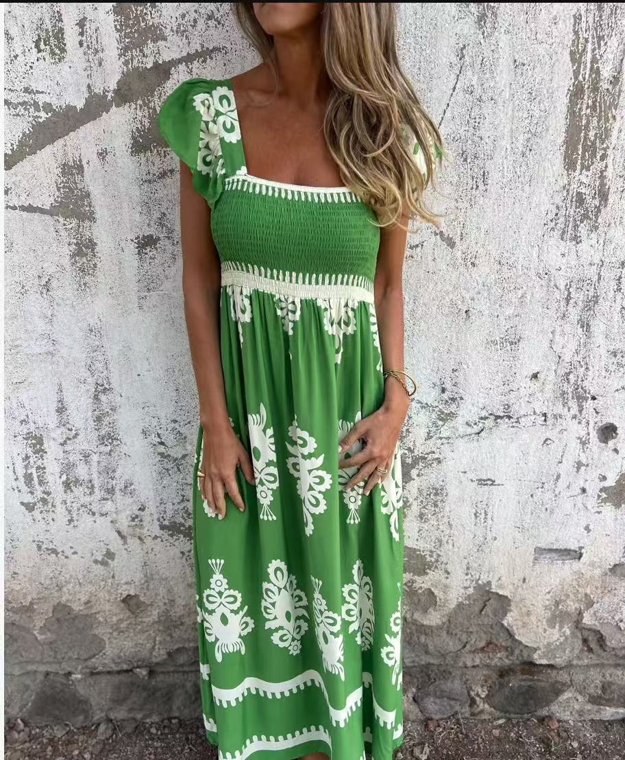 Elegantes Maxikleid mit raffiniertem Smok-Oberteil und floralen Akzenten von MODEGEIST