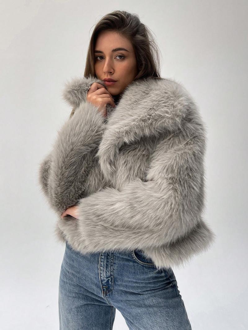 Damen Modischer Kunstpelz-Cropped-Jacke mit voluminösen Ärmeln ModeGeist