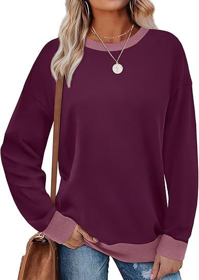 Damen bequemer Sweatshirt mit Raglanärmeln und dekorativem Kragen ModeGeist