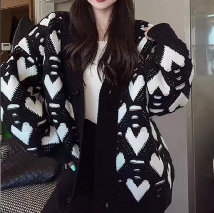 Damen Strickjacke mit einzigartigem Herzmuster und voluminösen Ärmeln ModeGeist