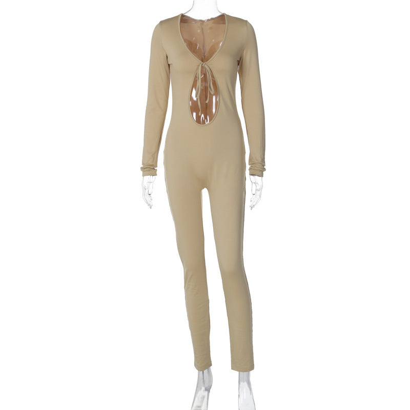 Modern, form-fitting jumpsuit with innovative cut-out design and long sleeves