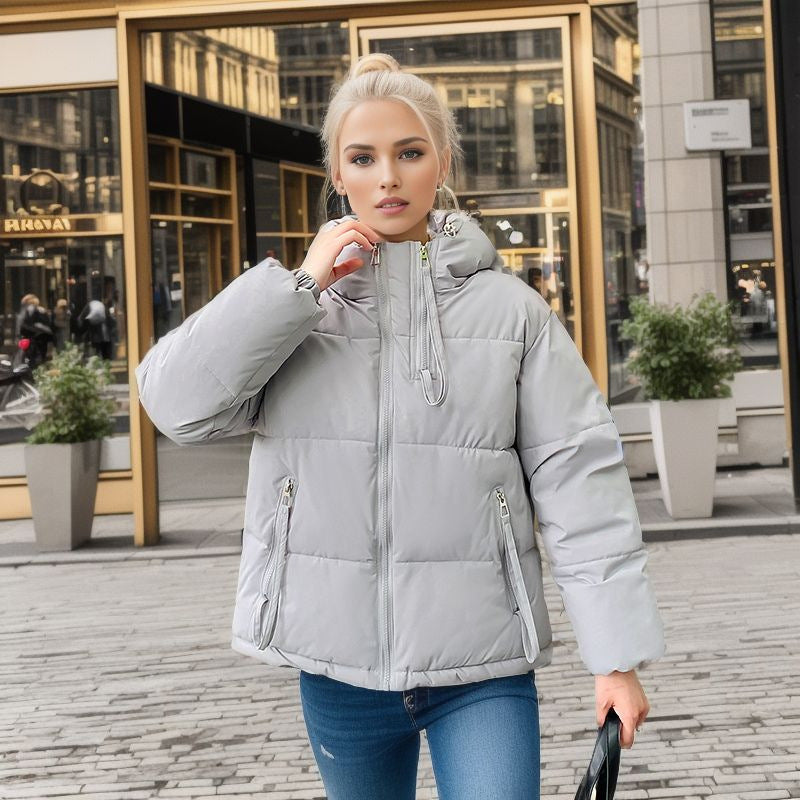 Damen modische Pufferjacke mit verstellbarer Kapuze und dicken Isolierungen ModeGeist