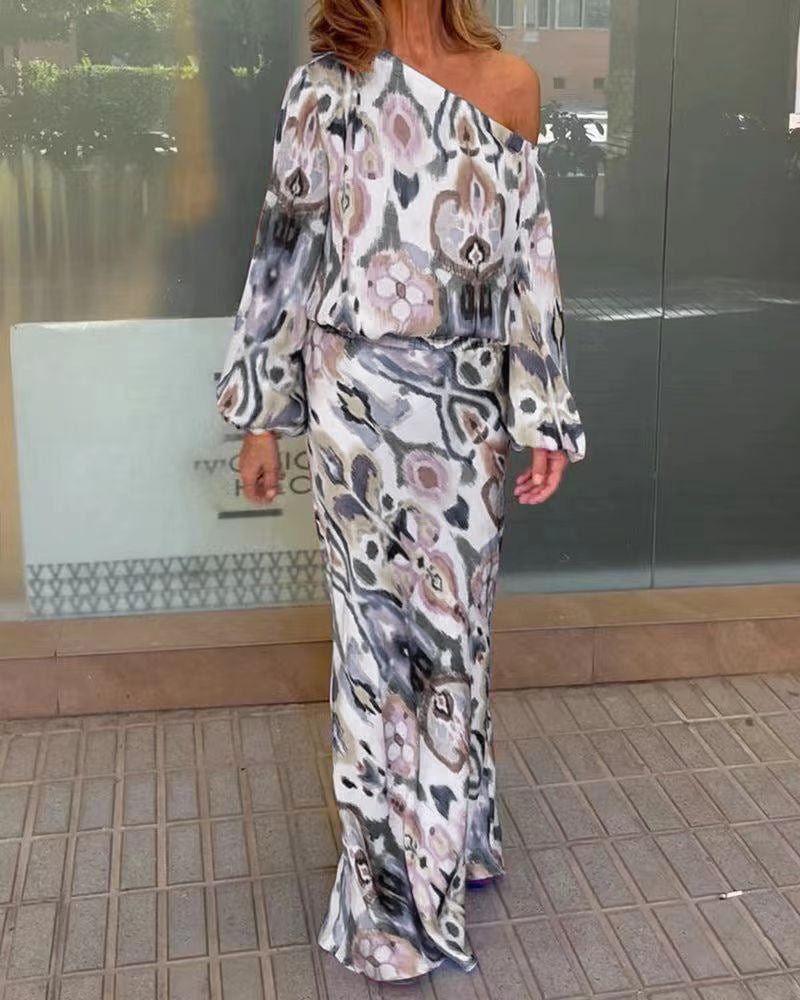 Damen Elegantes Maxikleid im grafischen Batikdesign mit Off-Shoulder-Ausschnitt und voluminösen Ärmeln ModeGeist