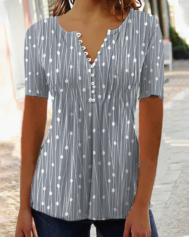 Modebewusste Damenbluse mit kurzen Ärmeln und dekorativen Knöpfen