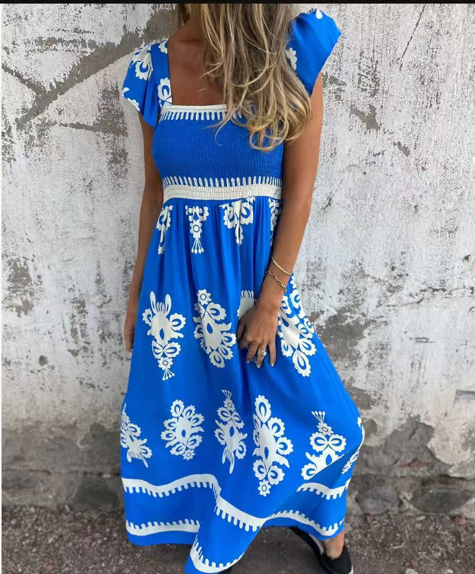 Elegantes Maxikleid mit raffiniertem Smok-Oberteil und floralen Akzenten von MODEGEIST