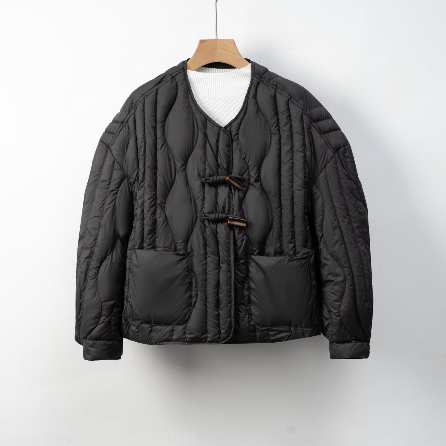 Damen Steppjacke mit praktischem Knopfverschluss und gemütlichen Taschen ModeGeist