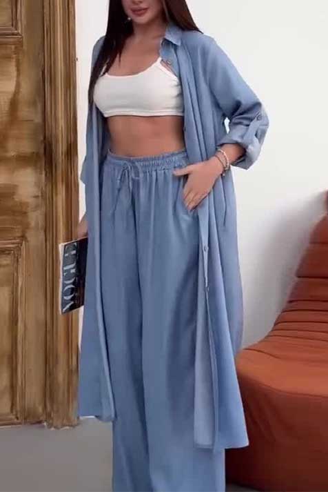 ModeGeist | Langer Mantel und Weit Geschnittene Hose Aus Einfarbigem Stoffanzug