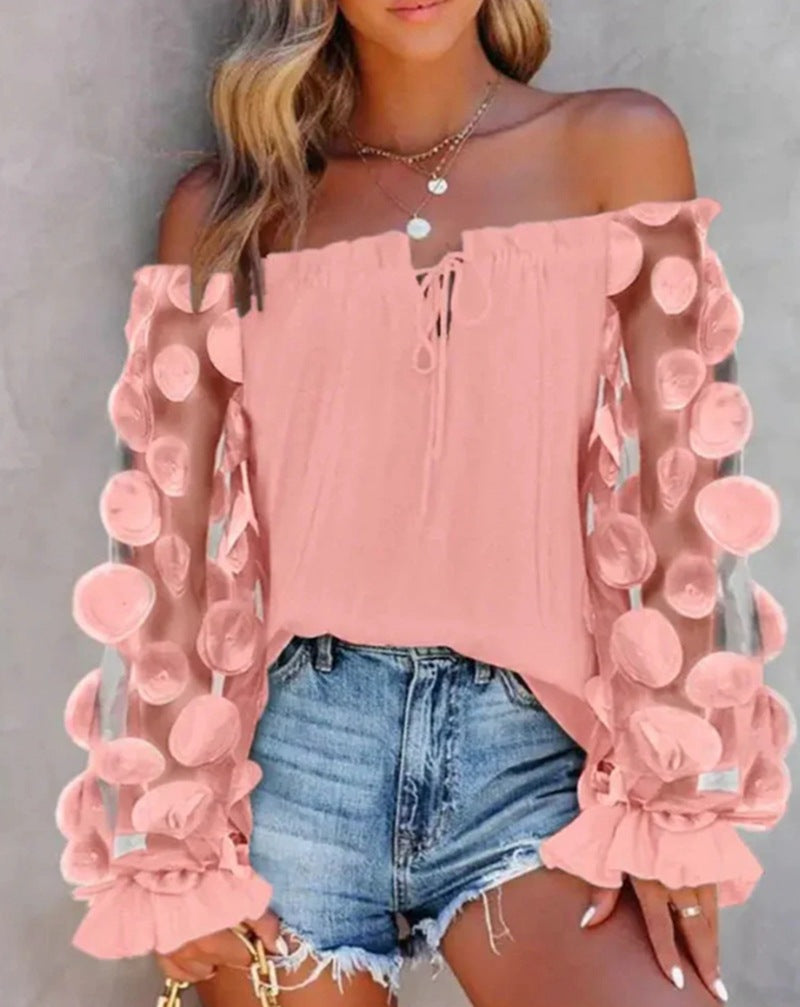Modegeist Bluse für Damen mit transparenten Puffärmeln und luftigen Elementen