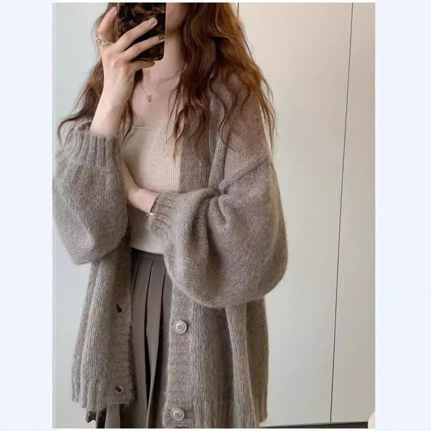 Damen Strickjacke im lässigen Oversized-Stil mit voluminösen Ärmeln und praktischen Taschen ModeGeist