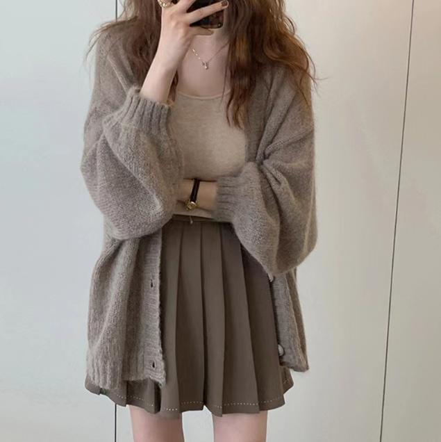 Damen Modische Strickjacke mit weiten Ärmeln und eleganten Details ModeGeist