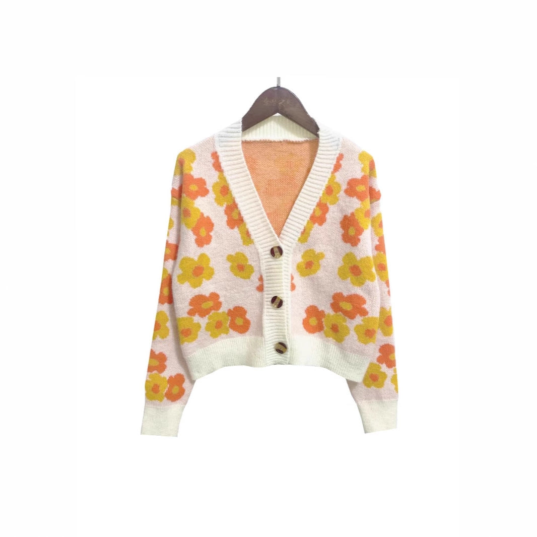 Damen cardigan mit floralem Muster und Knopfdetails ModeGeist