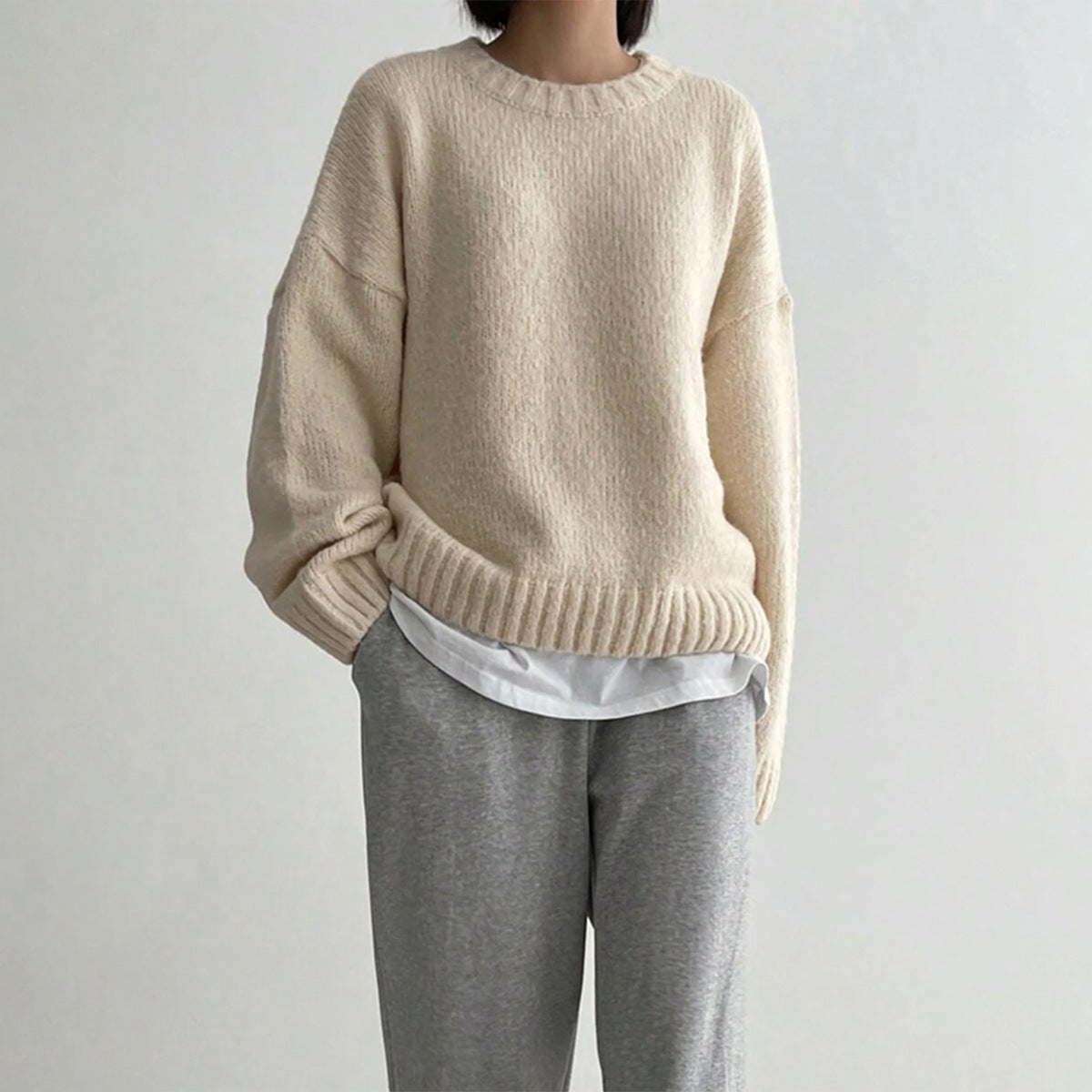 ModeGeist | Pullover Gestrickte Wolle Übergröße Schnitt Rundhalsausschnitt Rippendetails