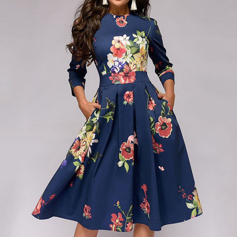 Elegantes Damen-Midikleid mit Blumenmuster und Taschen von MODEGEIST