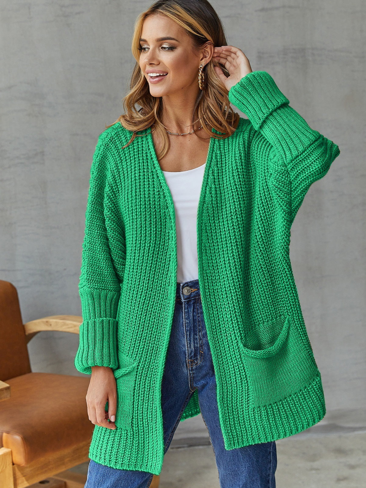 Damen gemütliche Strickjacke mit tiefen Taschen und volumetrischen Ärmeln ModeGeist