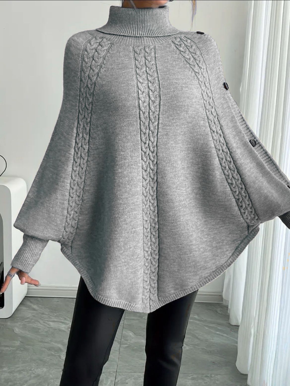 Damen Eleganter Strickponcho mit Rollkragen und Zopfmuster ModeGeist