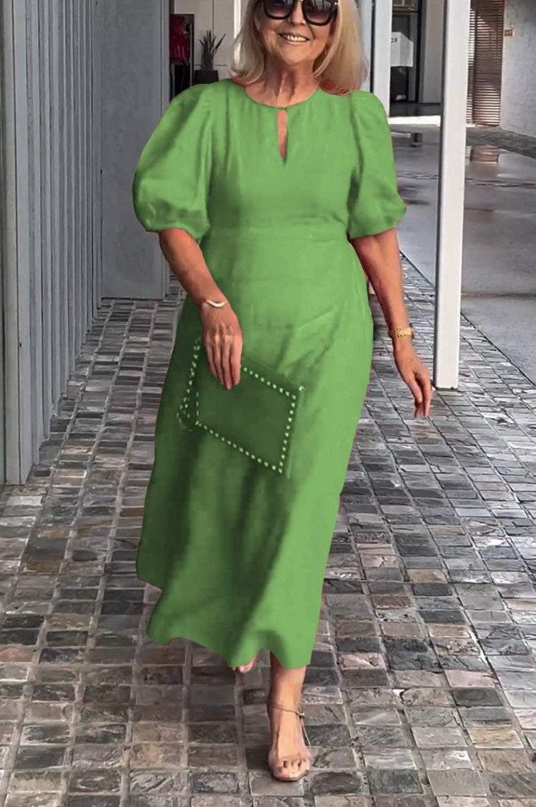 Elegantes Maxikleid für Damen mit Puffärmeln und dekorativem Saum von MODEGEIST