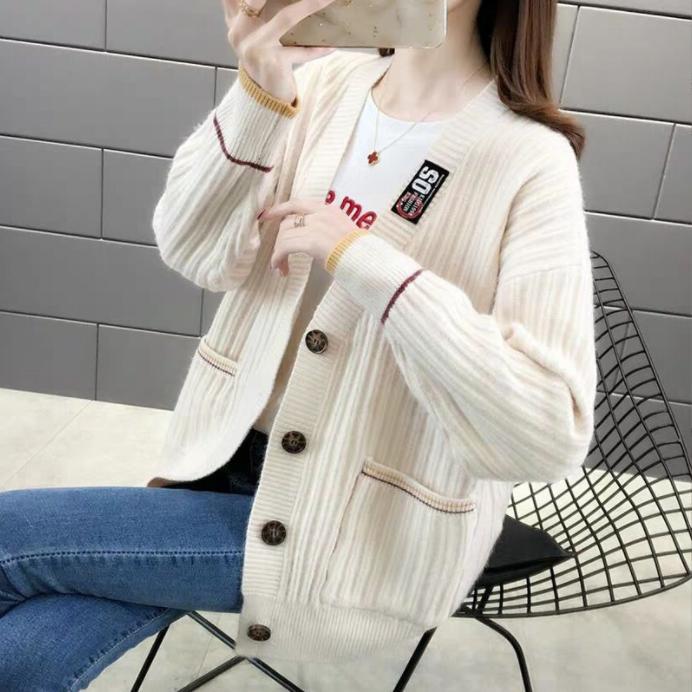 Damen Strickjacke mit strukturiertem Rippmuster und praktischen Taschen ModeGeist