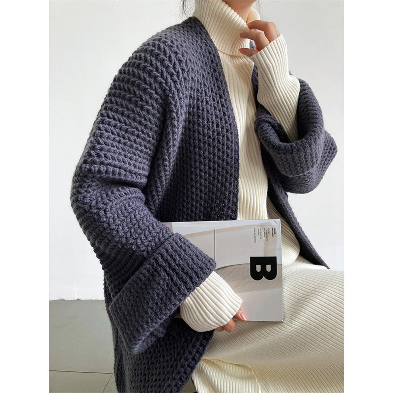 Damen Lange Strickjacke mit praktischen Taschen und modischem Zopfmuster ModeGeist