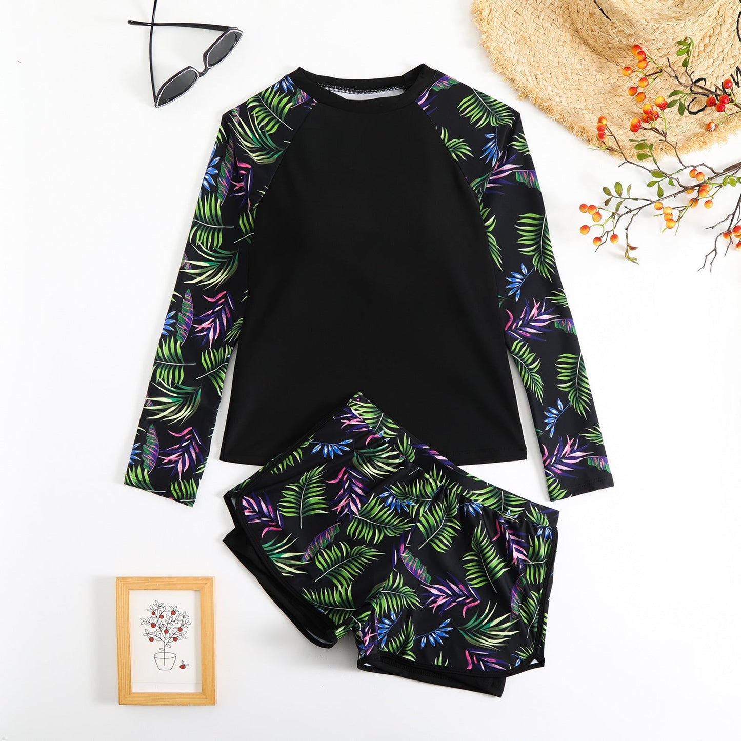Modischer UV-Schutz Badeanzug für Damen mit langen Ärmeln und Blätter-Print von MODEGEIST