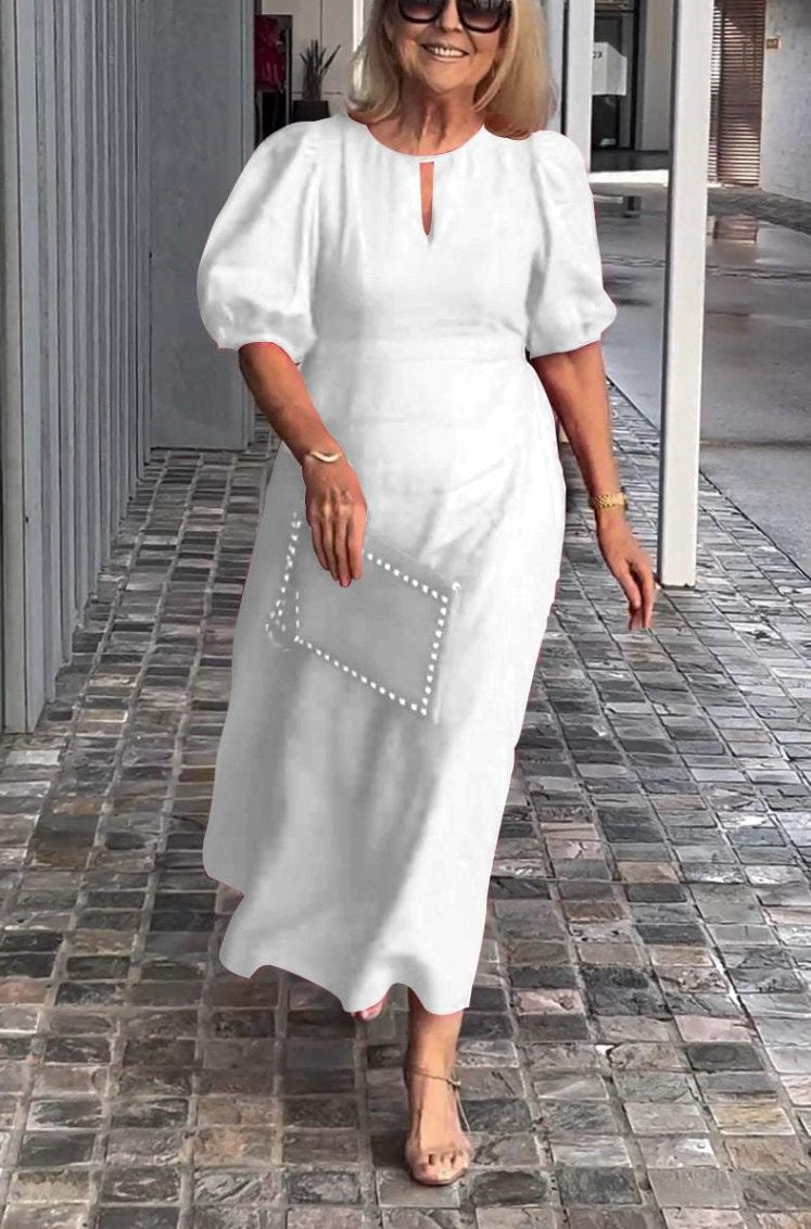 Elegantes Maxikleid für Damen mit Puffärmeln und dekorativem Saum von MODEGEIST