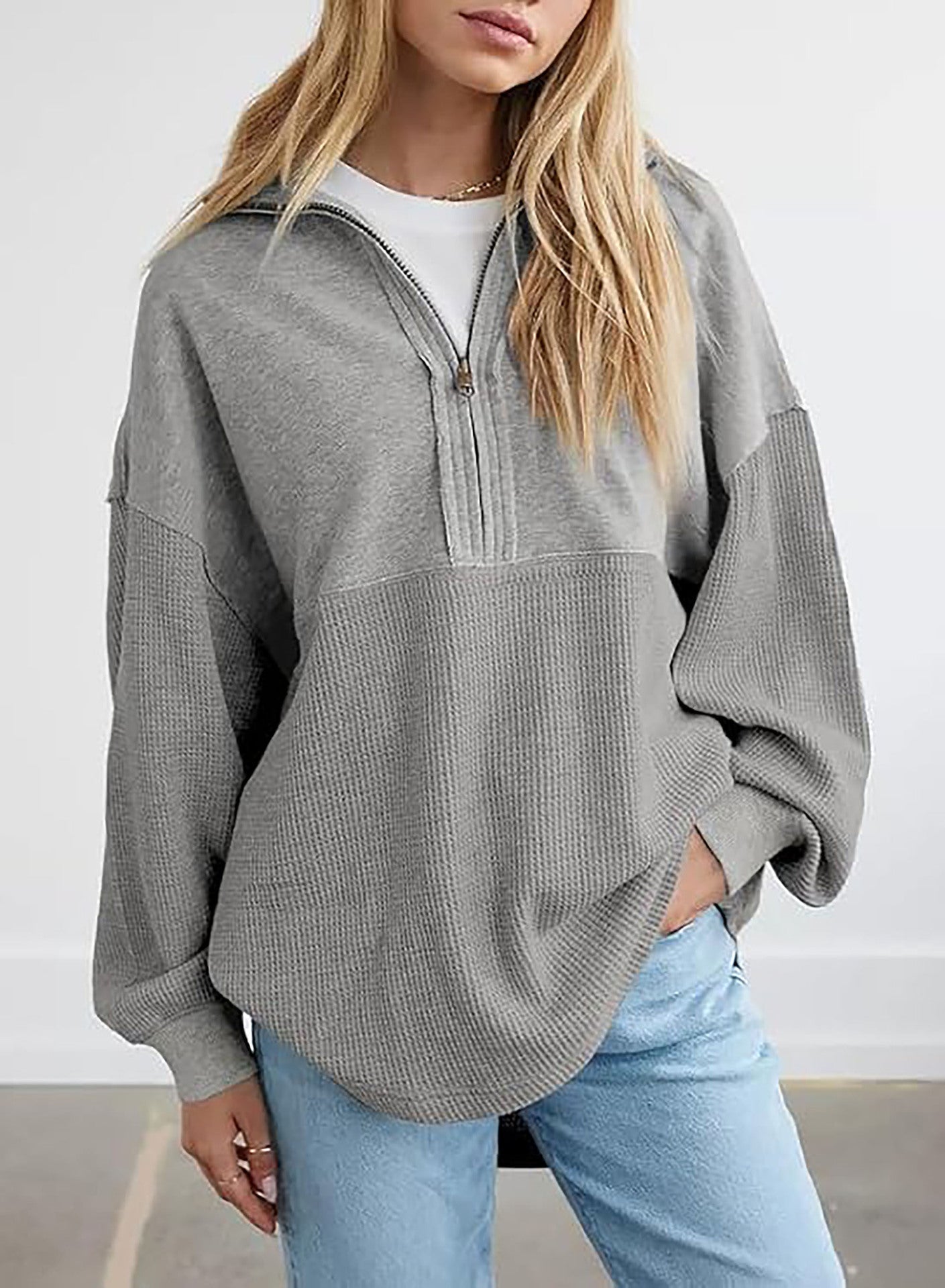 Damen lässiger Kapuzenpullover mit halblangem Reißverschluss und strukturiertem Material ModeGeist