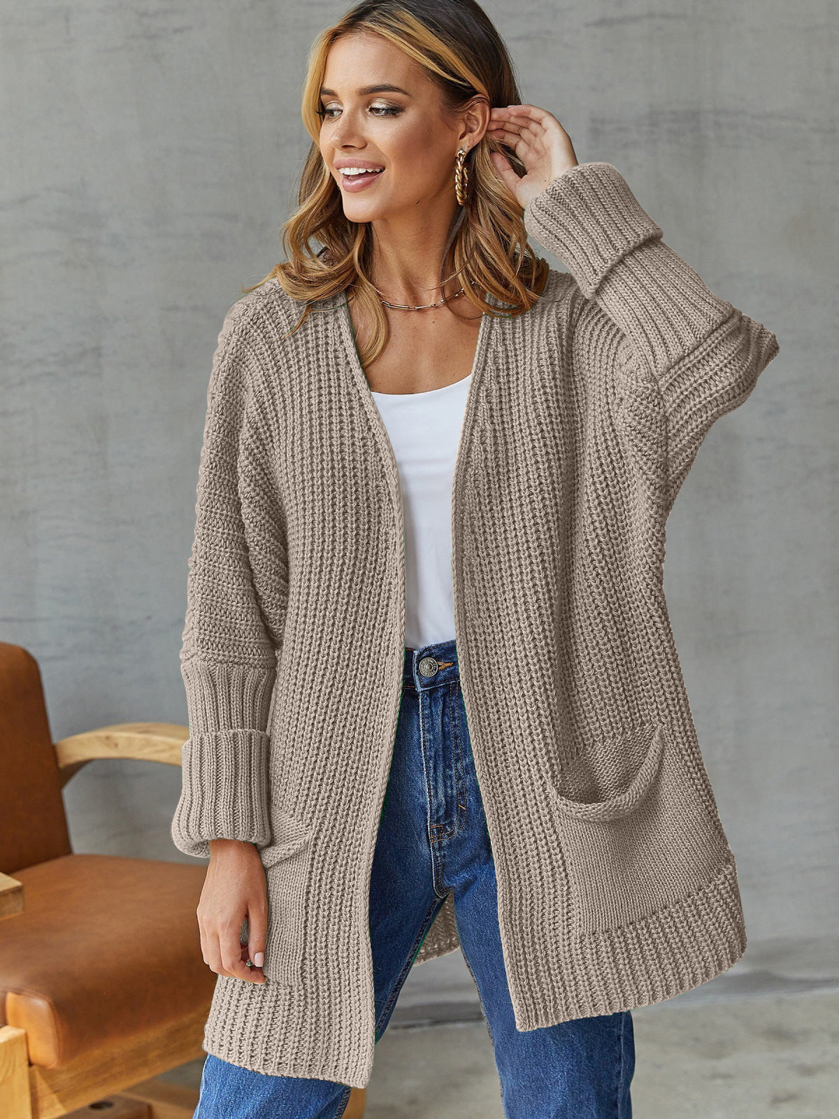 Damen gemütliche Strickjacke mit tiefen Taschen und volumetrischen Ärmeln ModeGeist