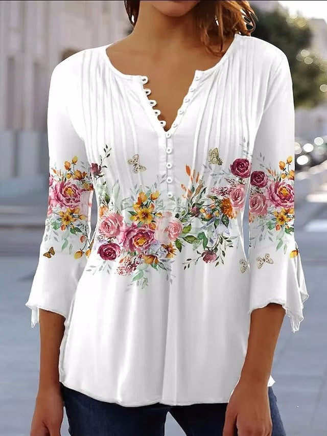Elegante Damenbluse mit floralem Muster und Knoppelementen von MODEGEIST