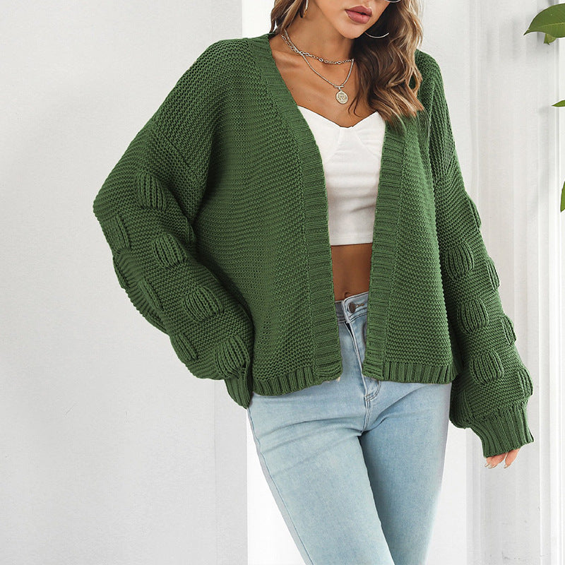 Damen Grobstrickjacke mit voluminösen Ärmeln und modernem Design ModeGeist