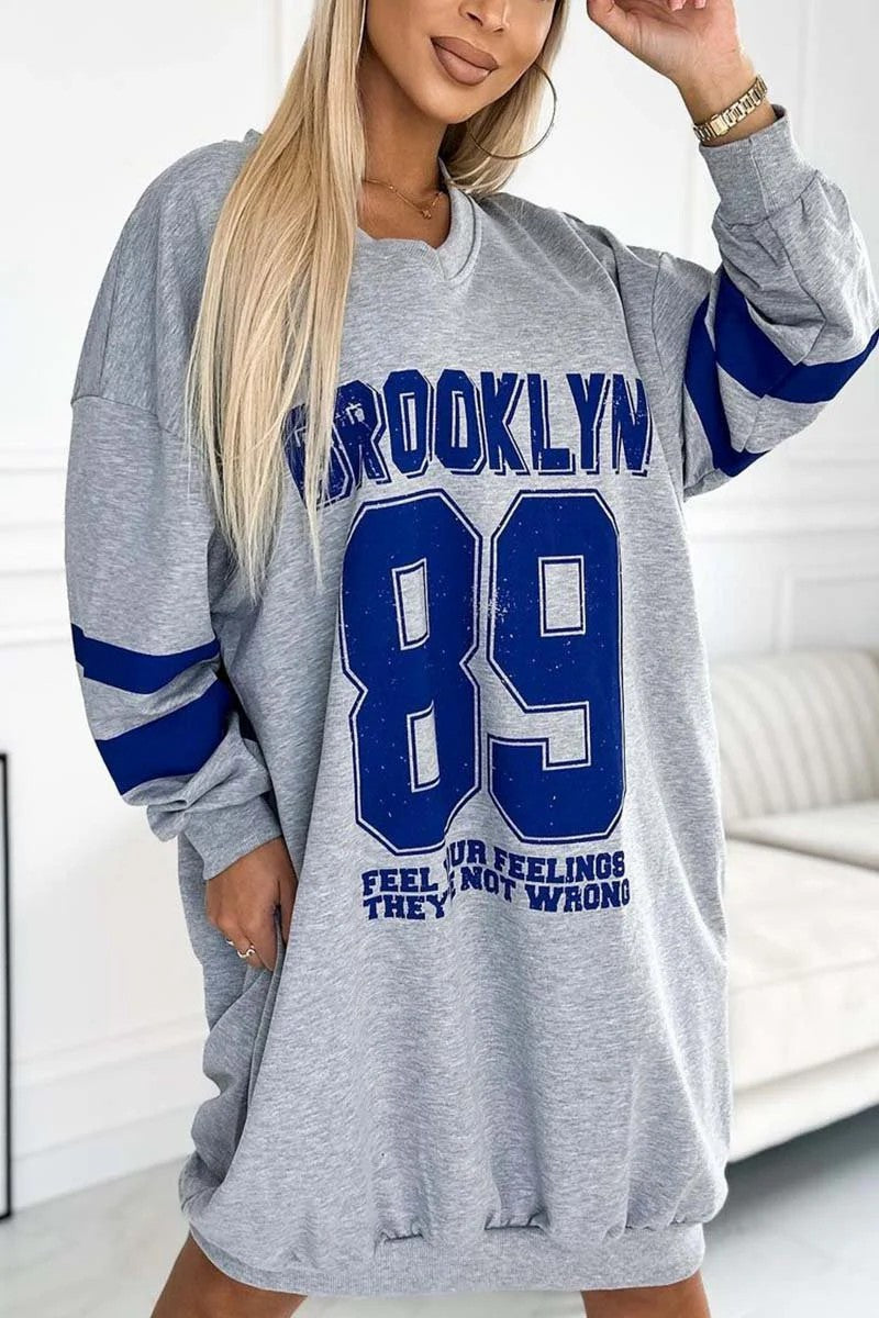 Damen lässiges oversized Sportkleid mit V-Ausschnitt und kontrastierenden Ärmeln ModeGeist