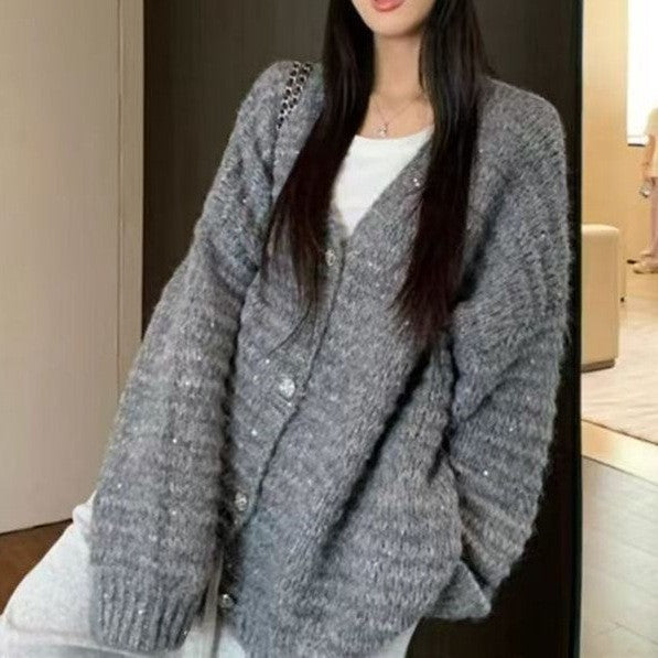 Damen Strickjacke mit voluminösen Ärmeln und einzigartiger Maschenstruktur ModeGeist