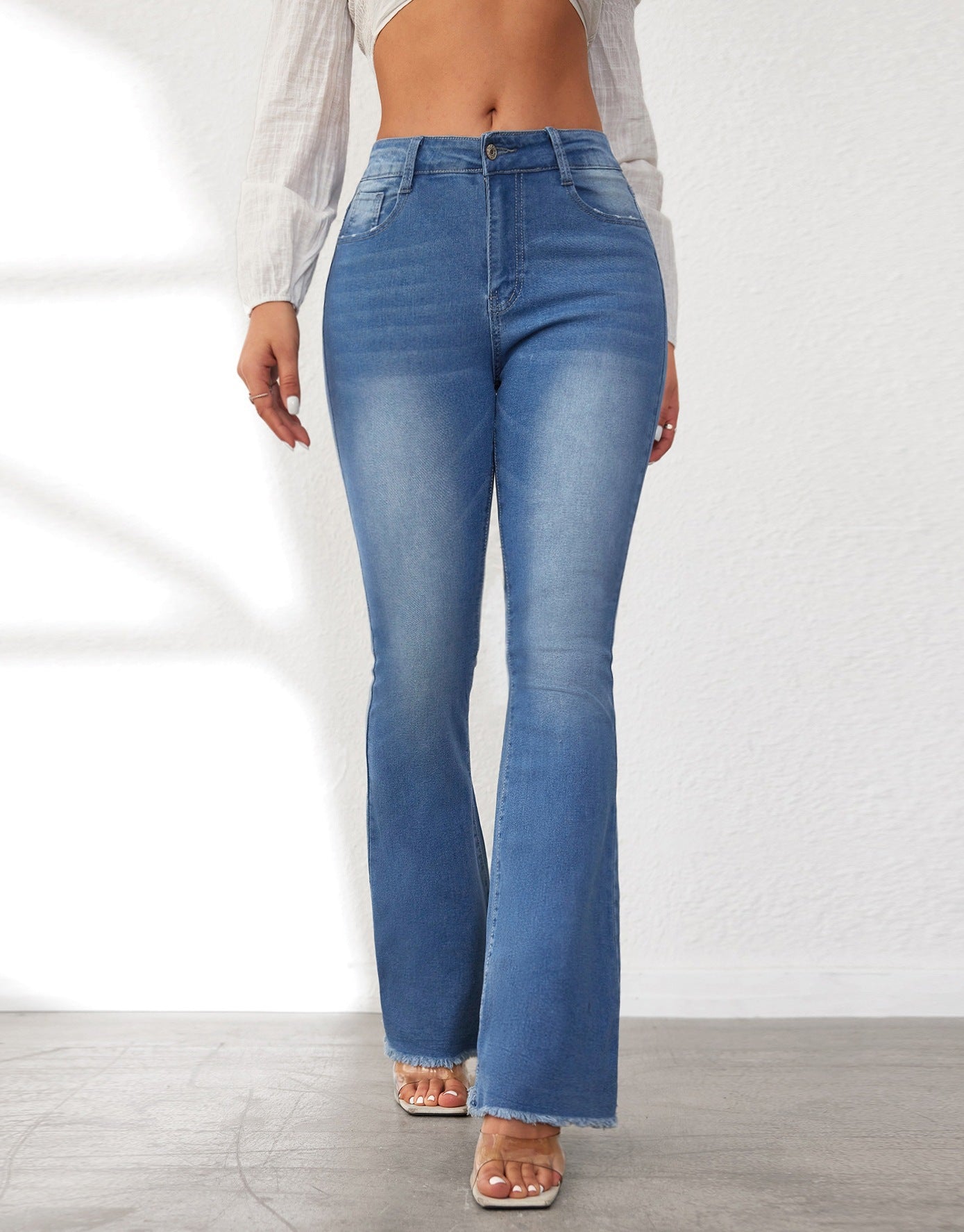 Damen Flared Jeans mit stylishen Fransen und hohem Bund ModeGeist