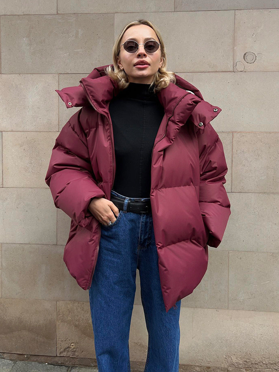 Damen sportliche Daunenjacke mit hohem Kragen und voluminösem Schnitt ModeGeist