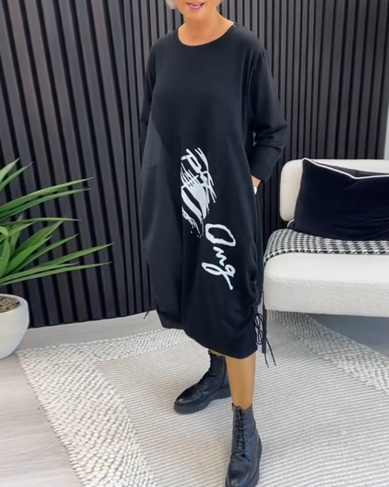 Modegeist Damen Oversized Kleid mit grafischem Design und Seitentaschen
