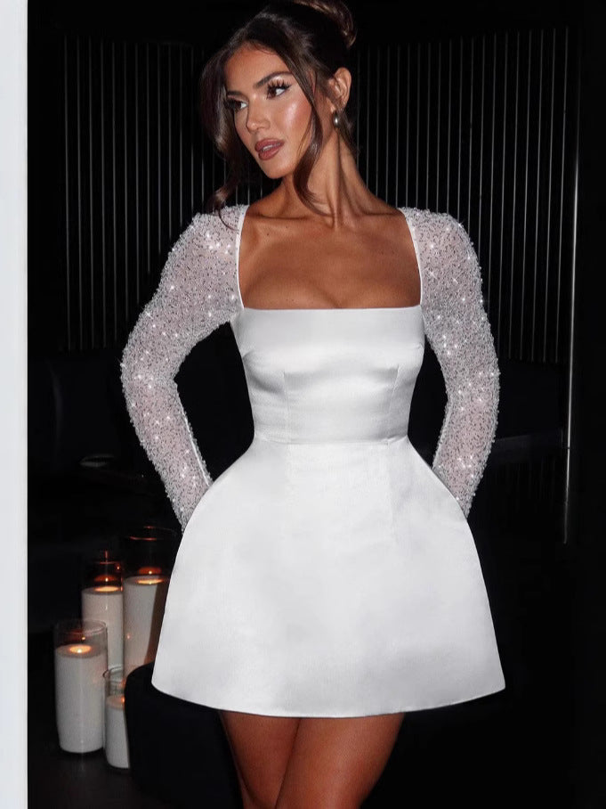Damen Glamouröses Minikleid mit transparenten Paillettenärmeln und schwingendem Rock ModeGeist